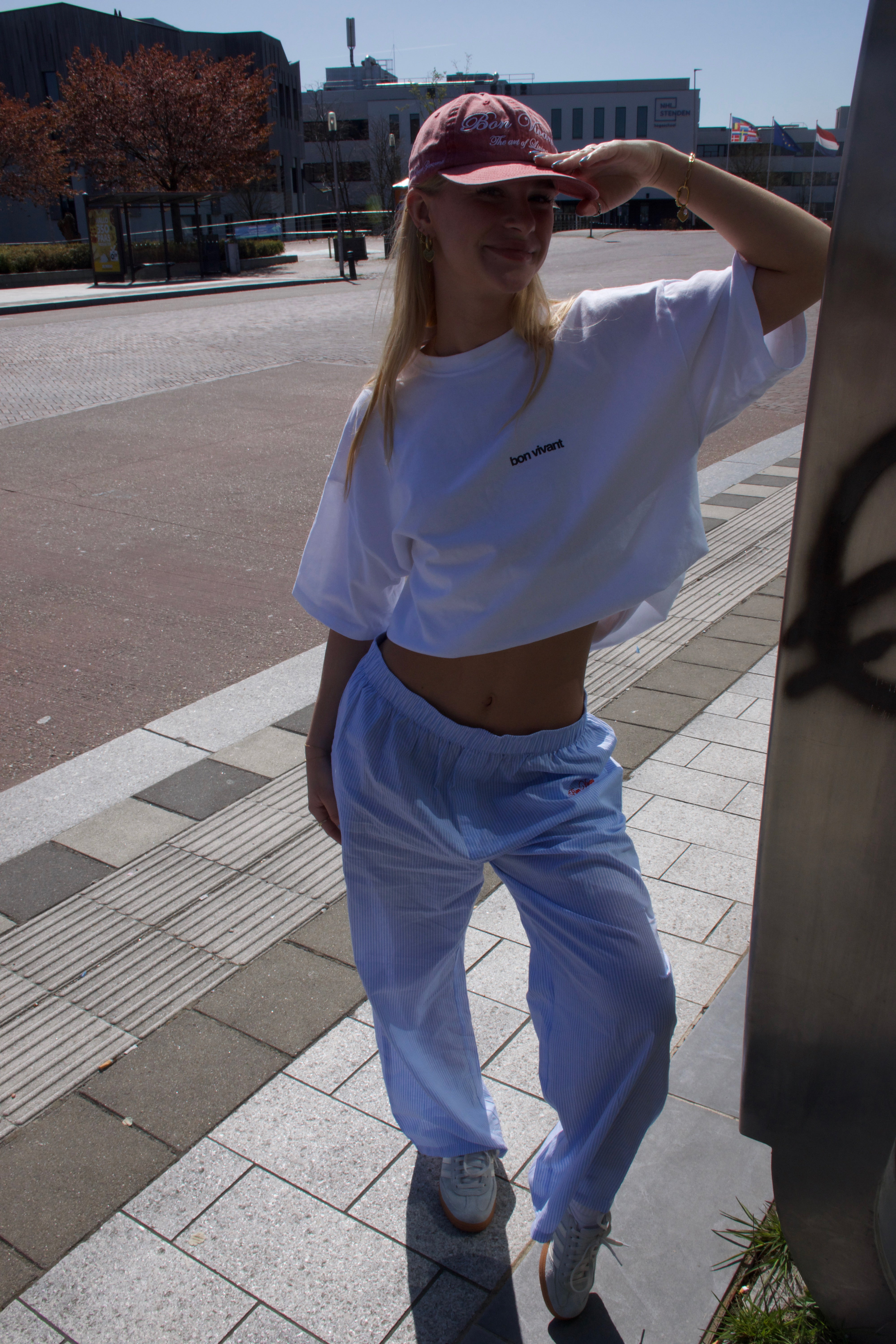 BlondModelWearingNothingIsForeverTeeFrontSmiling
